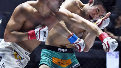 로드FC 플라이급 챔피언 이정현, 편예준의 저돌성에 어렵게 1차 방어 성공해