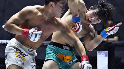 이정현, 로드FC 플라이급 챔피언 첫 방어 성공...12연승 신기록!